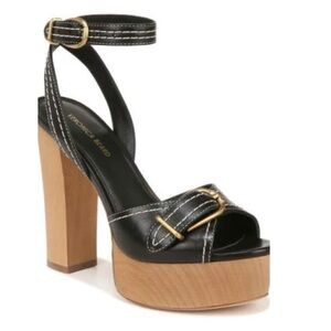 Brand new no box. Buckled straps and contrast stitching add visual intrigue